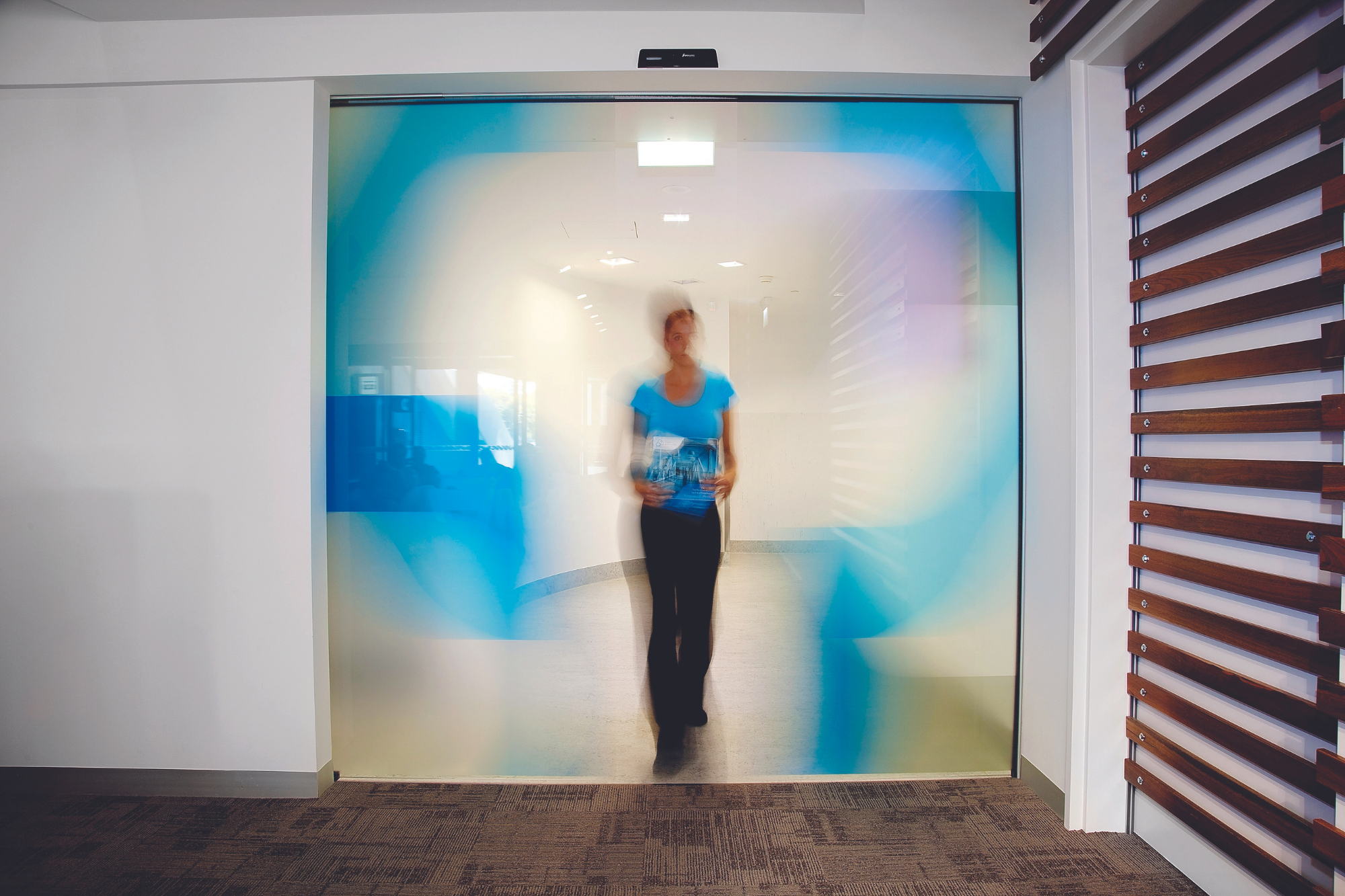 Woman Blurred At The Iop Reception Door | Radiography And Medical Imaging | Imaging At Olympic Park